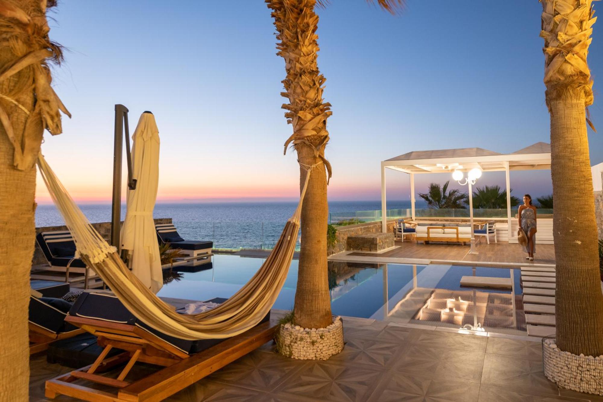Minos Imperial Luxury Beach Resort & Spa Milatos Dış mekan fotoğraf The pool at the hotel