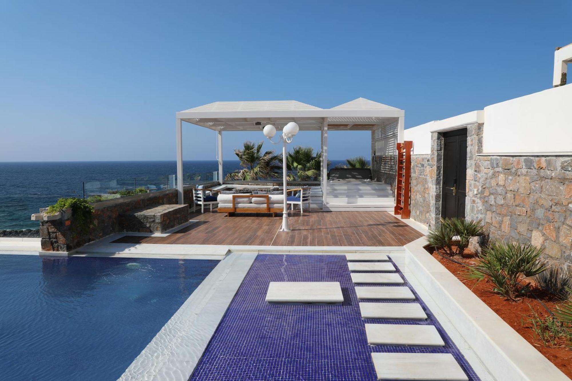 Minos Imperial Luxury Beach Resort & Spa Milatos Dış mekan fotoğraf The pool at the hotel